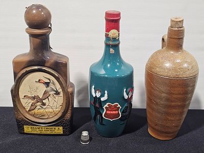 3 garrafas de bebidas diversas