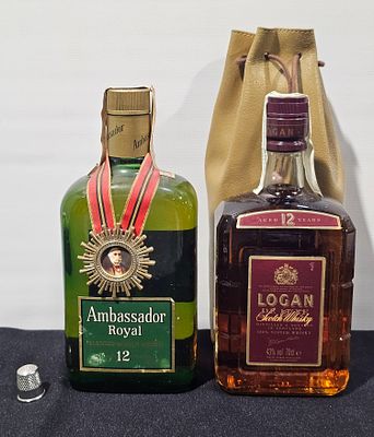 2 garrafas de whisky ambassador royal e logan