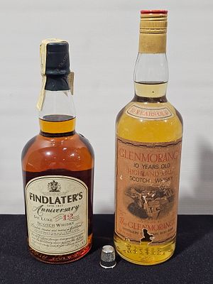 2 garrafas de whisky findlater's 12 anos aniversay e glenmorangie