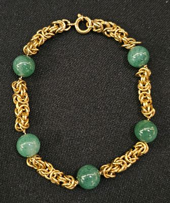 Pulseira em ouro 800 com 12,6 gramas, com pérolas jaidite
