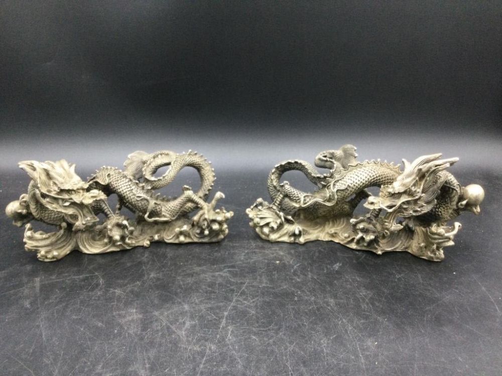 Lot 34: White Brass Dragons