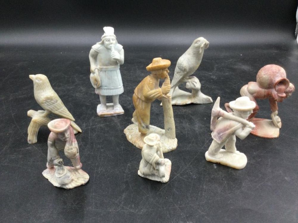 Lot 101: Carved Stone Statues