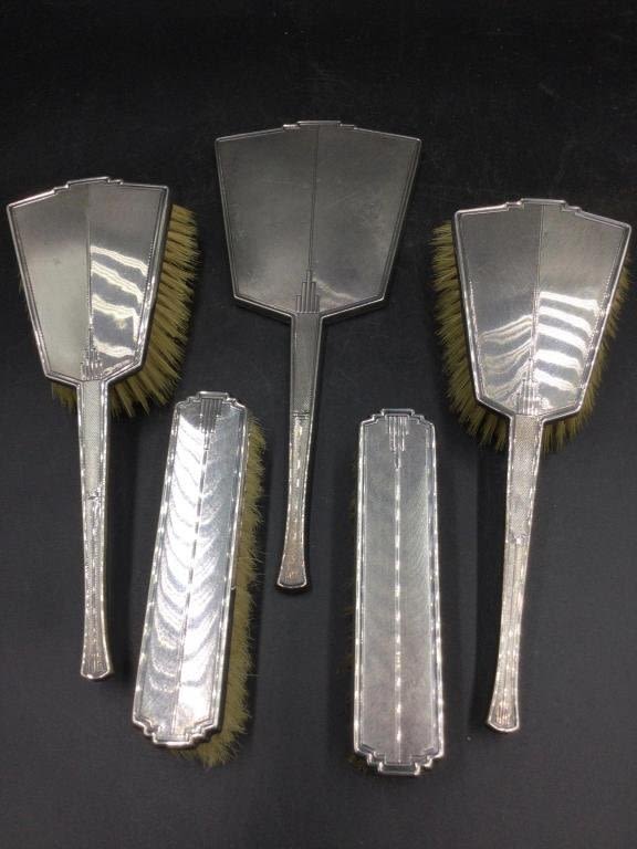 Lot 142: Sterling Brushes and Mirror