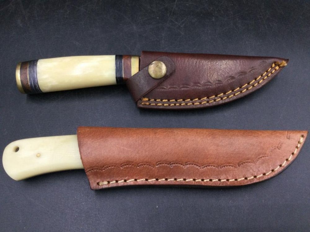 Lot 174: Damascus Steel Knives