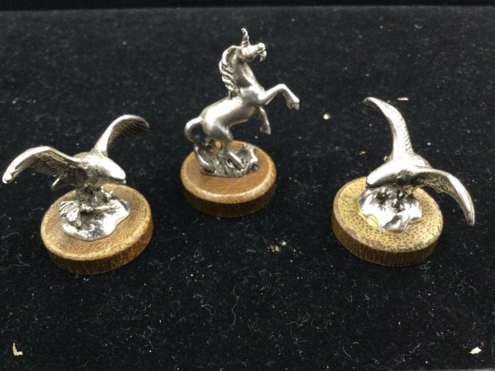 Lot 175: Miniature Sterling Statues