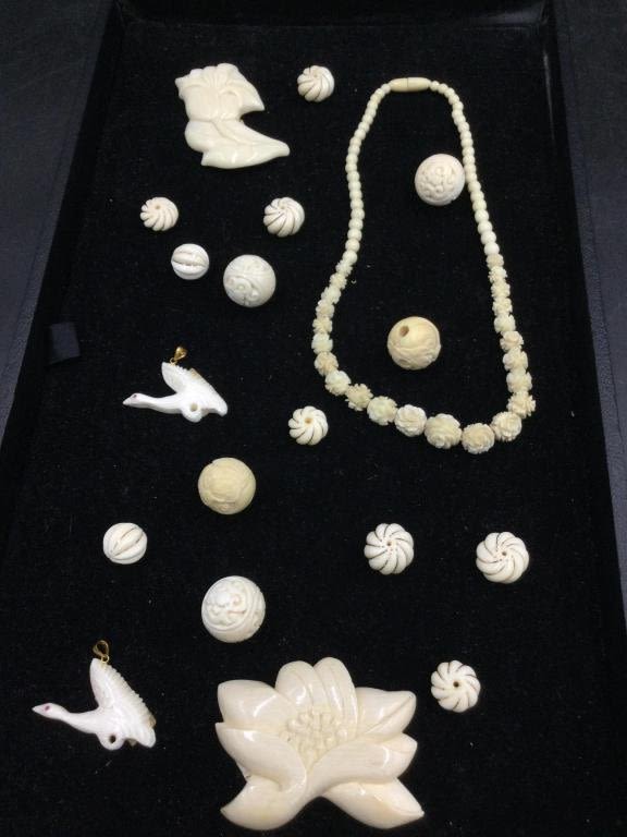 Lot 181: Carved Jewelry