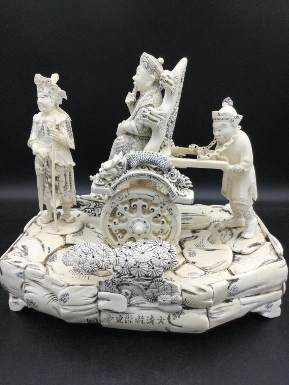 Lot 208: Carved  Figures