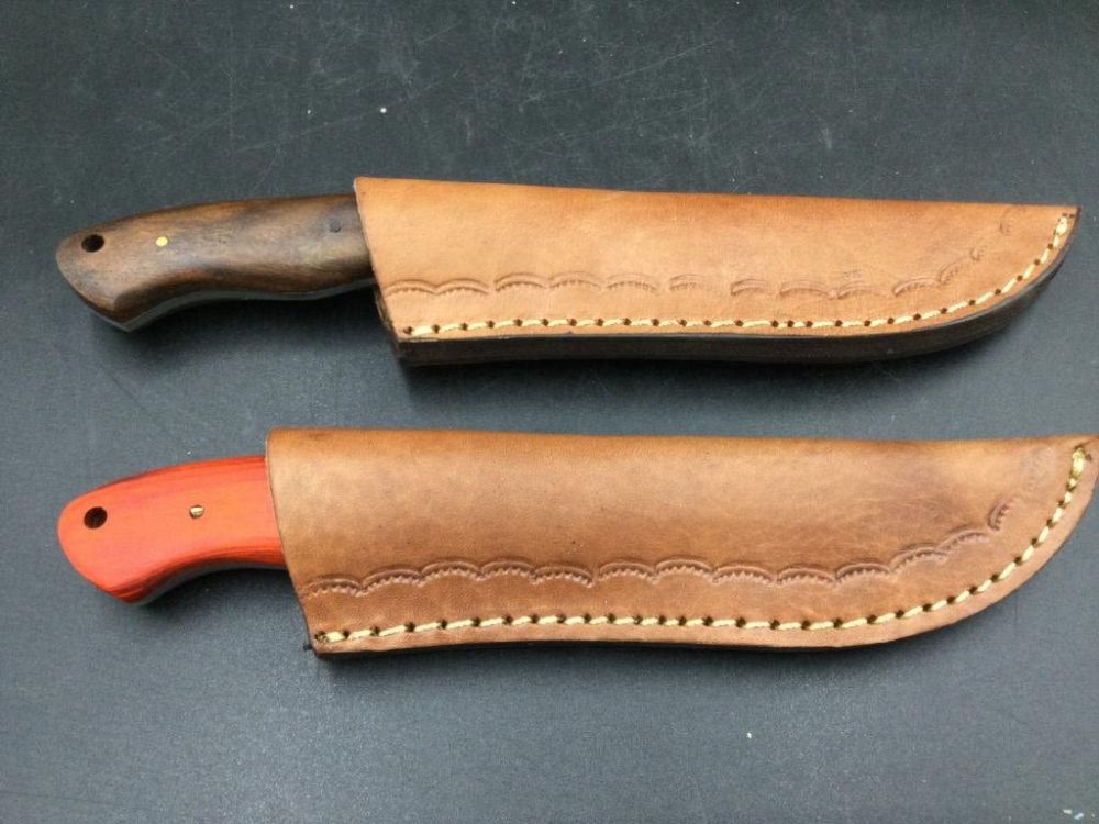 Lot 211: Damascus Steel Knives