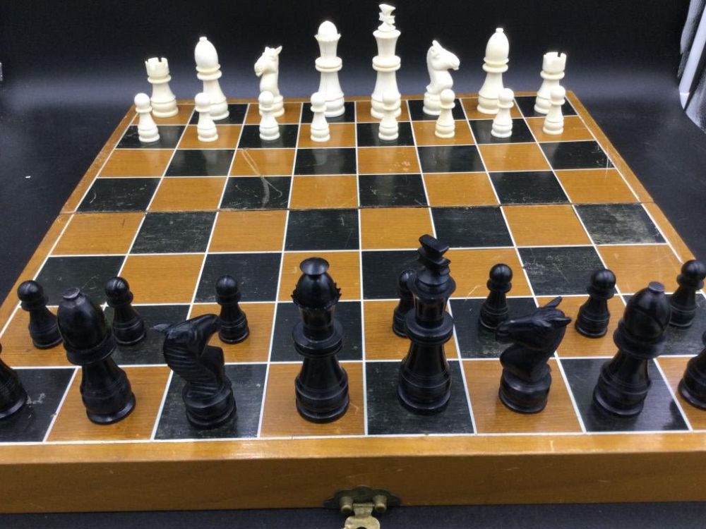 Lot 233: Beautiful carved solid chess set.