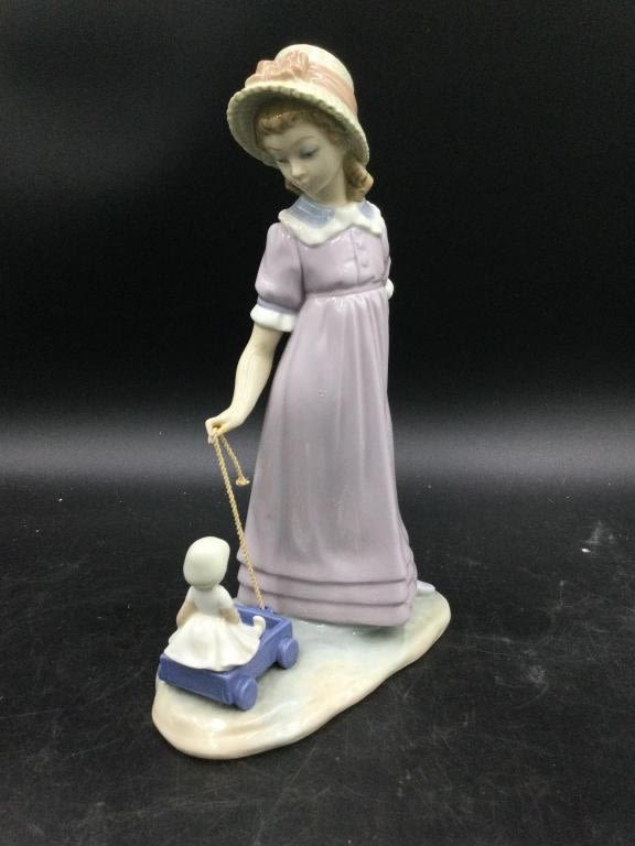 Lot 5: Lladro Girl Pulling Doll Toy Wagon