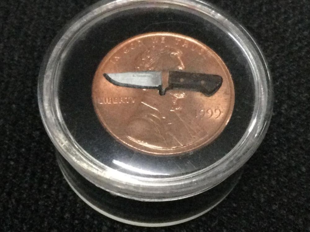 Lot 84: Miniature Knife in Penny