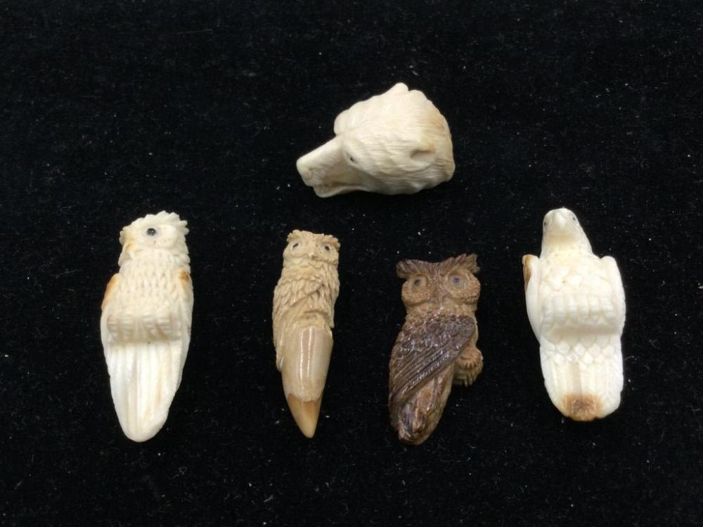 Lot 131: Fossilized Mammoth Fetishes