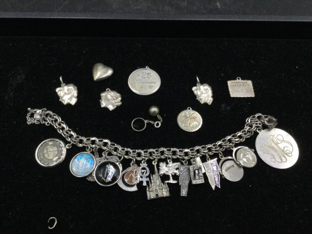 Lot 141: Sterling Charm Bracelet w/Charms