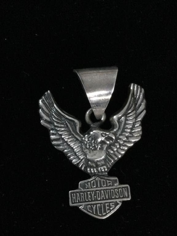 Lot 154: Sterling Harley Davidson Pendant