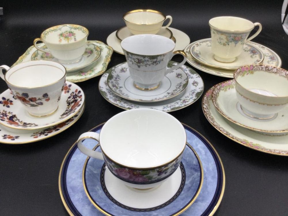 Lot 156: Vintage Porcelain Cups & Saucers