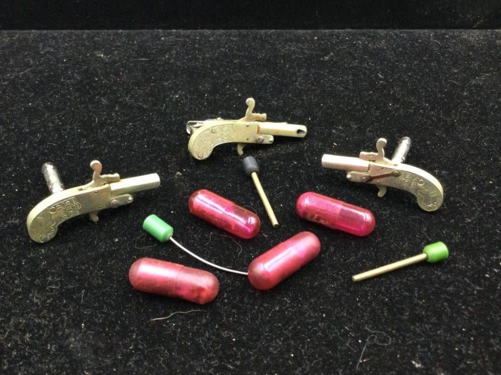 Lot 217: Vintage Cap Guns Tie Tacks