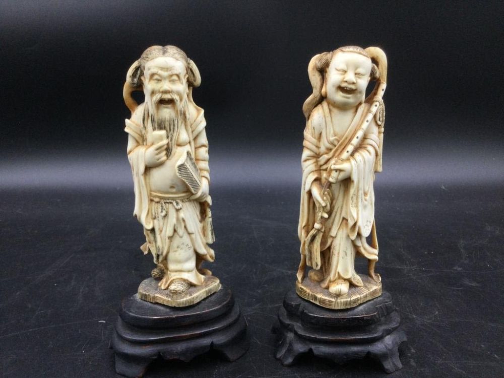 Lot 7: Carved Asian Statues