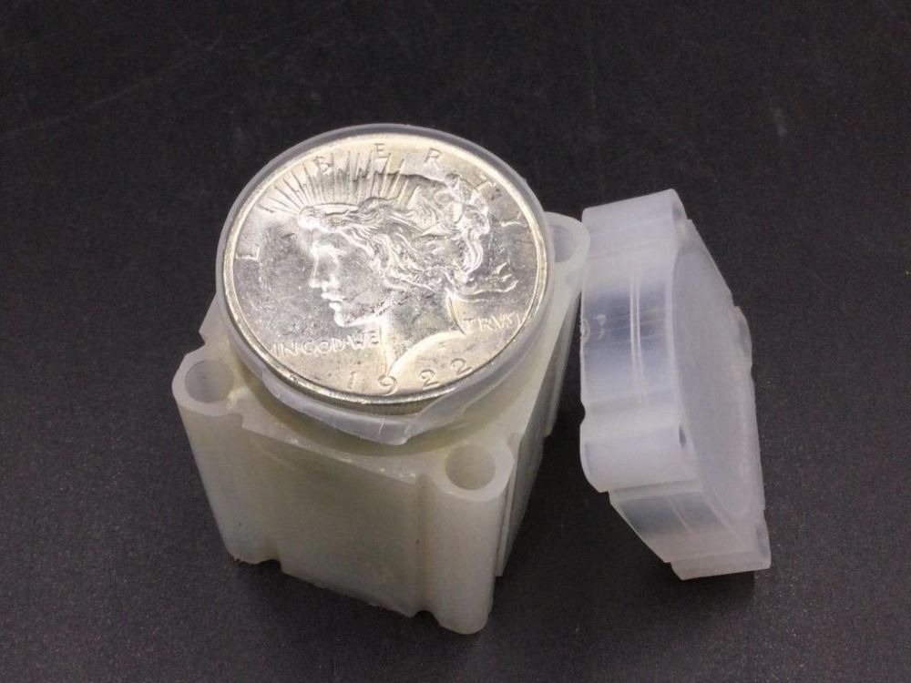 Lot 77: Uncirculated Peace Dollars