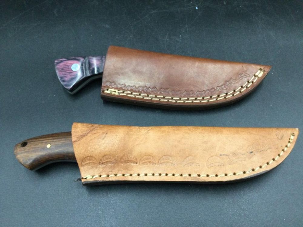 Lot 119: Damascus Steel Knives