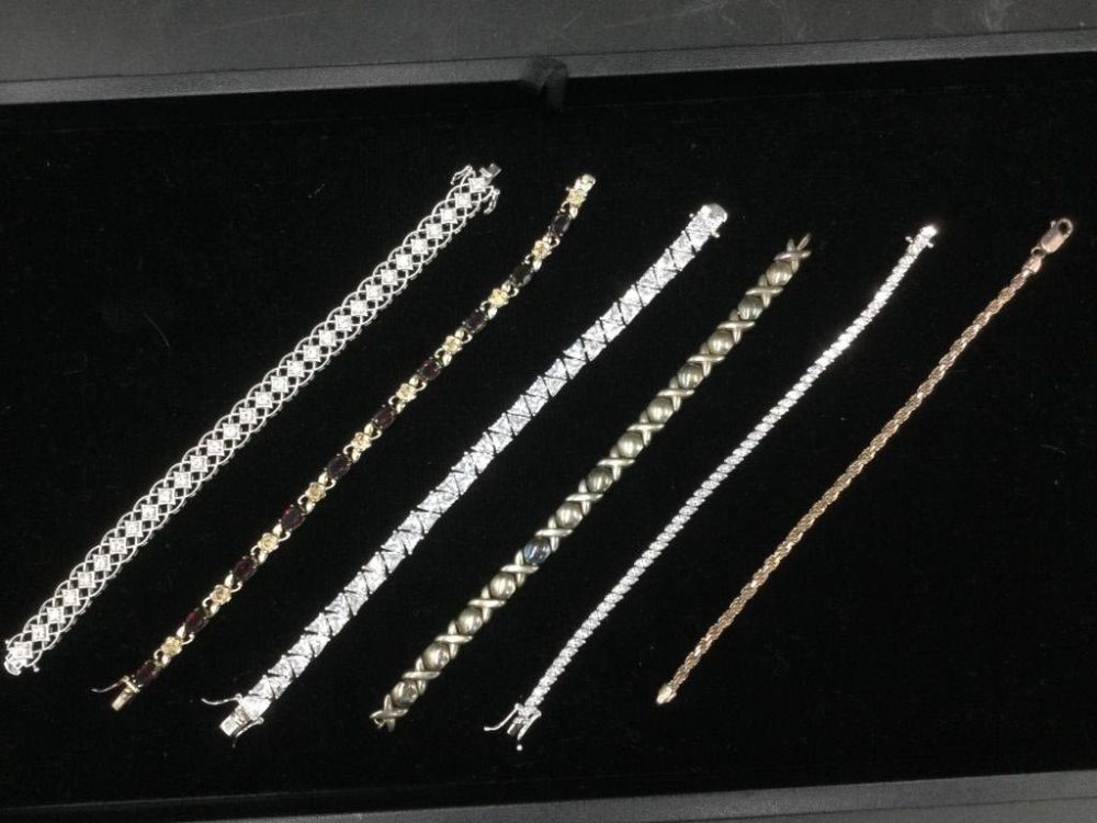 Lot 208: Sterling Bracelets
