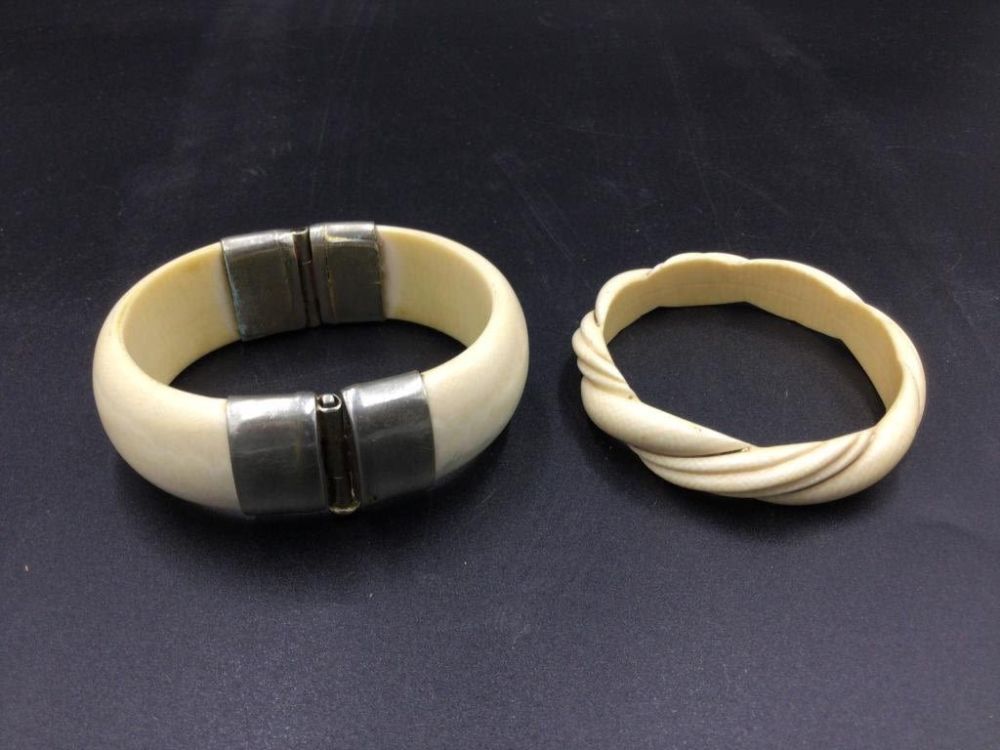 Lot 46: Carved Bangle Bracelets