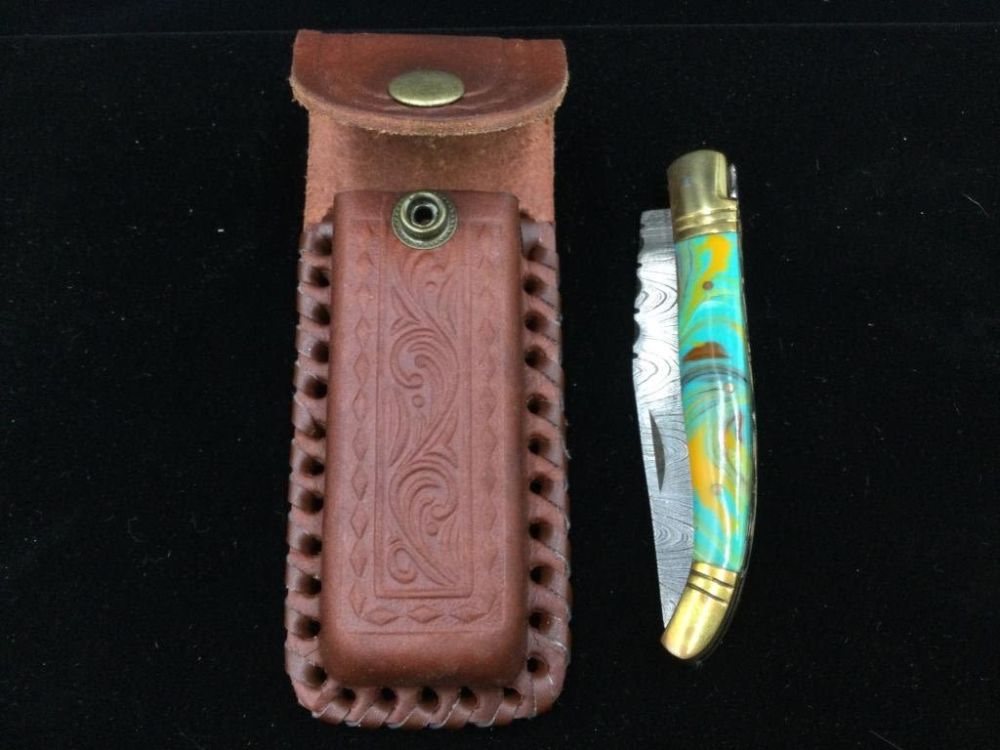 Lot 186: Damacus Steel Folding Knife
