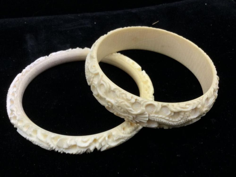Lot 201: Carved Bangle Bracelets