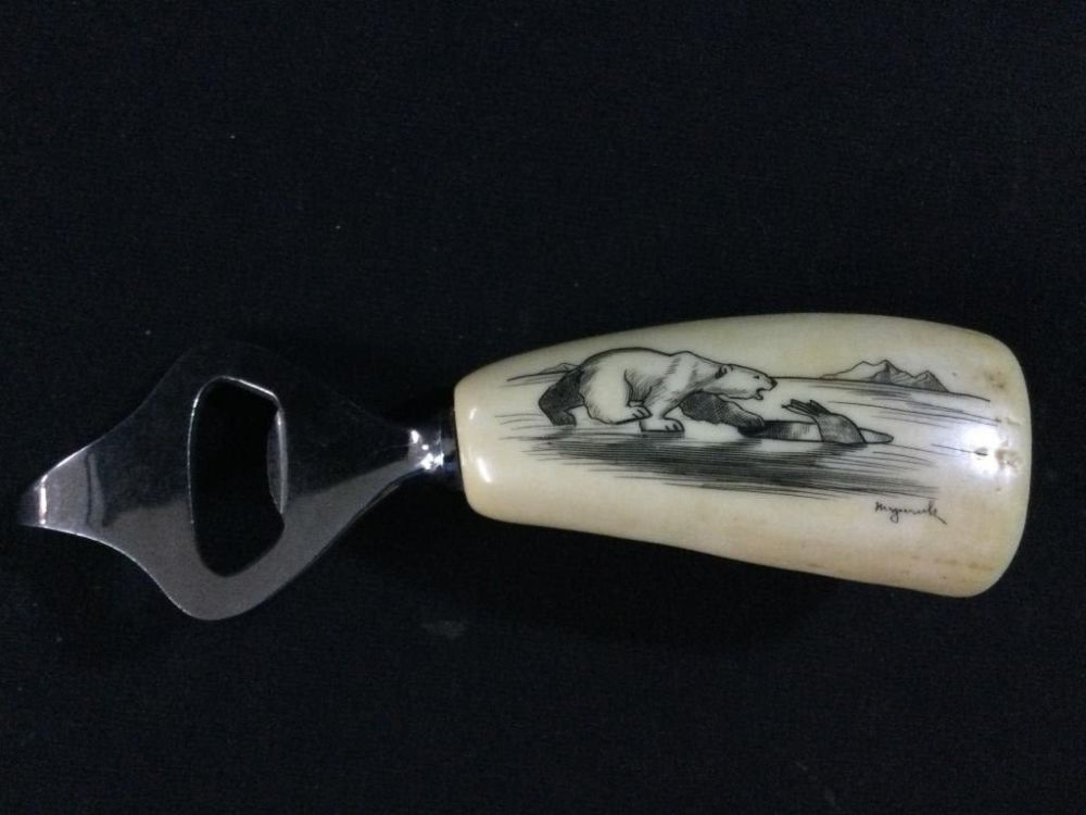 Lot 145: Scrimshawed Whale Tooth Opener