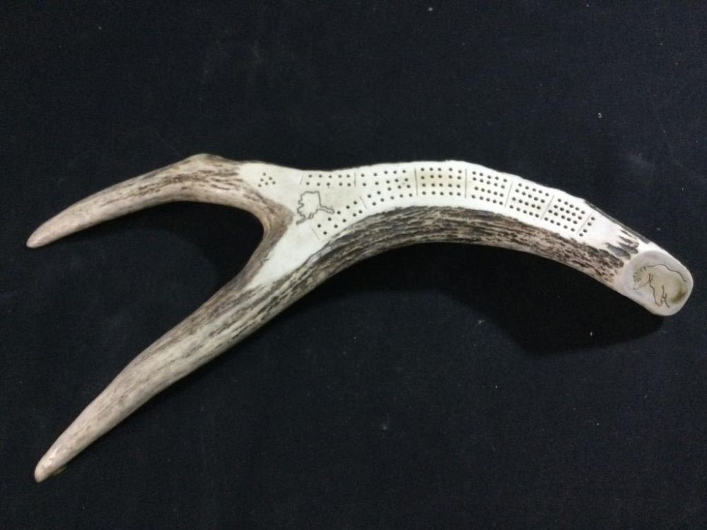 Lot 200: Carved Caribou Antler Cribbage Board