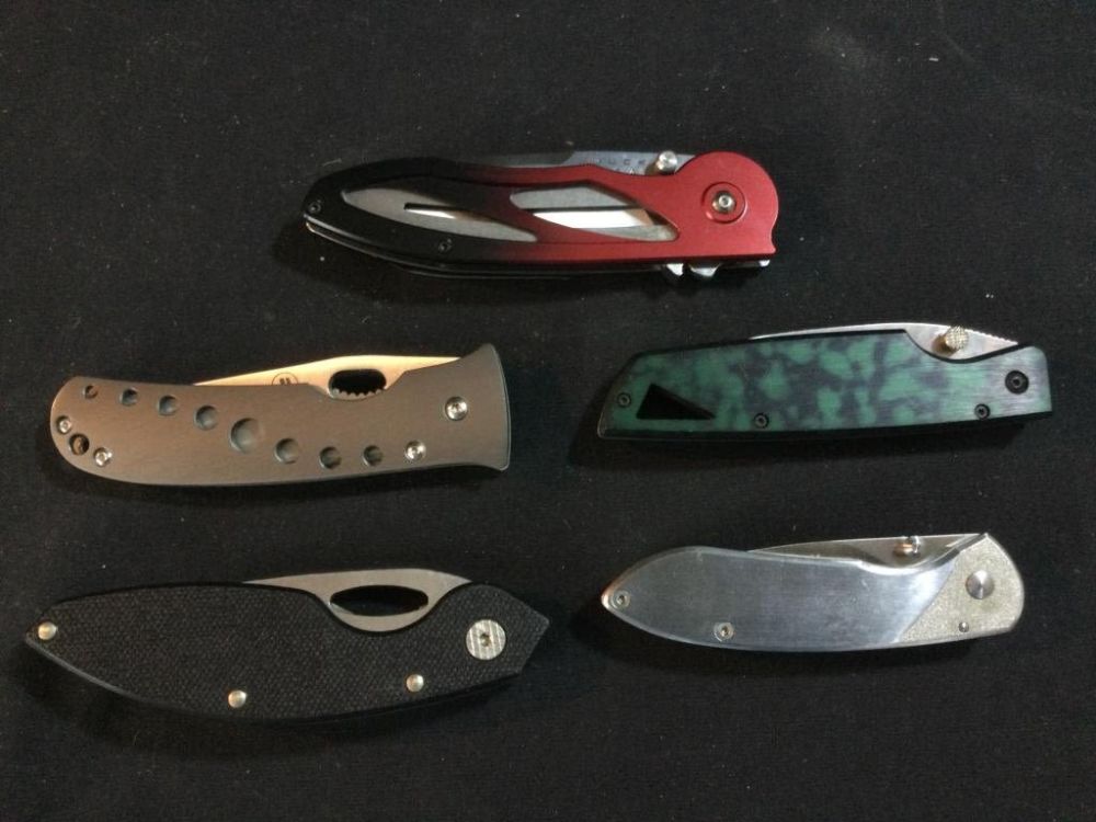 Lot 208: Buck Pocket knives