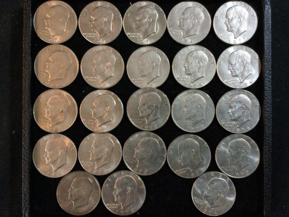 Lot 230: Ike Silver Dollars