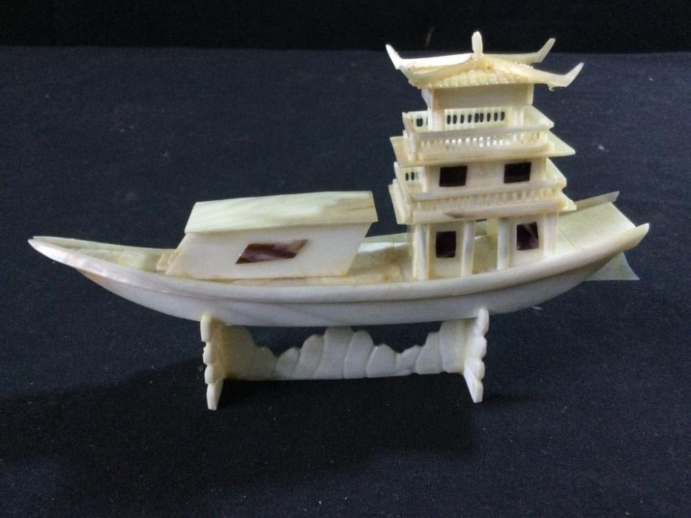 Lot 52: Japanese Mother of Pearl Boat Figure