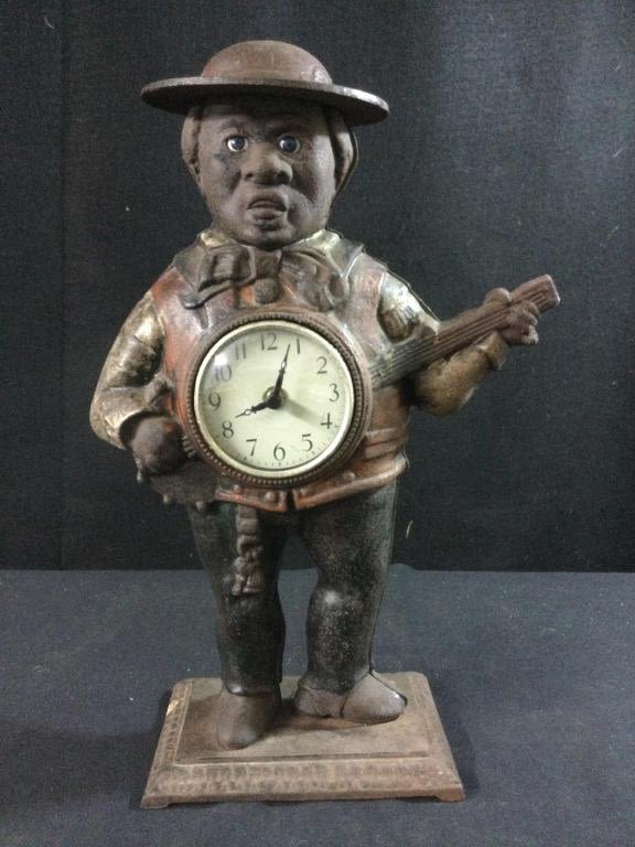 Lot 91: Vintage Cast Iron Sambo Figure Clock