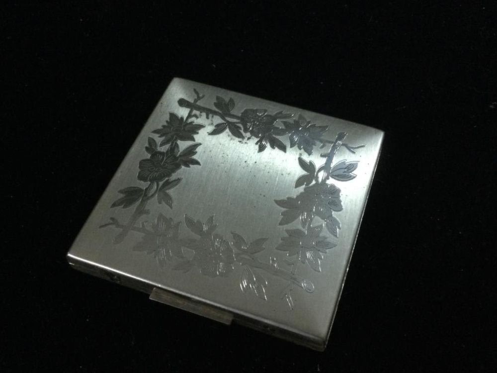 Lot 9: Sterling Compact