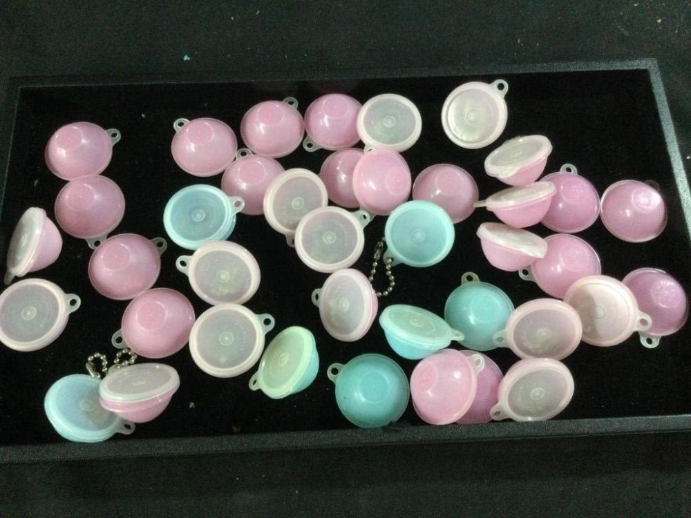 Lot 139: Vintage Tupperware Key Chains