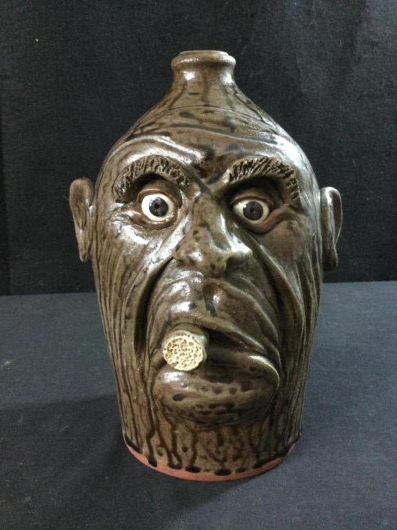 Lot 171: Fork Art Face Jug