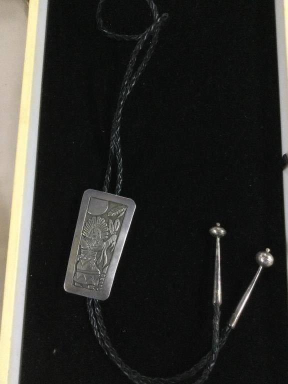 Lot 223: Navajo Sterling Bolo