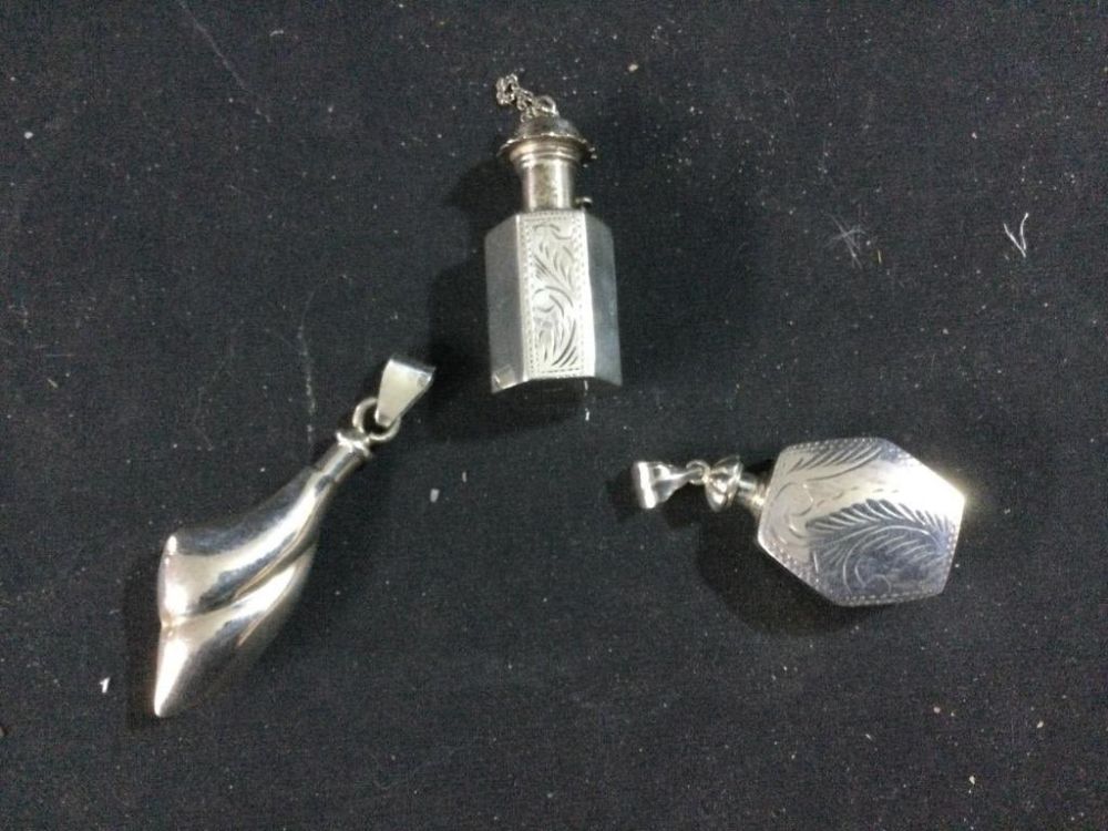 Lot 15: Sterling Perfume Bottle Pendants