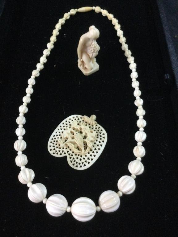Lot 67: Carved Jewelry & More