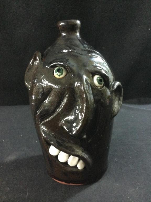 Lot 105: Fork Art Face Jug "Signed"