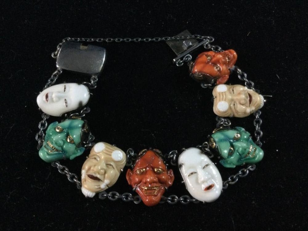 Lot 138: Sterling Asian God Bracelet