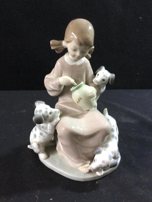 Lot 164: Lladro Girl Sitting with Puppies
