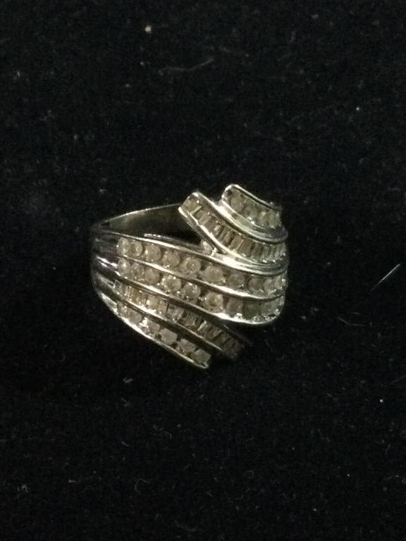 Lot 235: 10kt Diamond & White Gold Ring