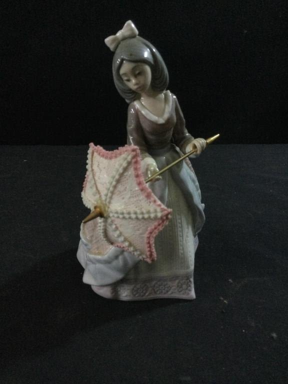 Lot 238: Lladro Girl with Umbrella "Jolie"
