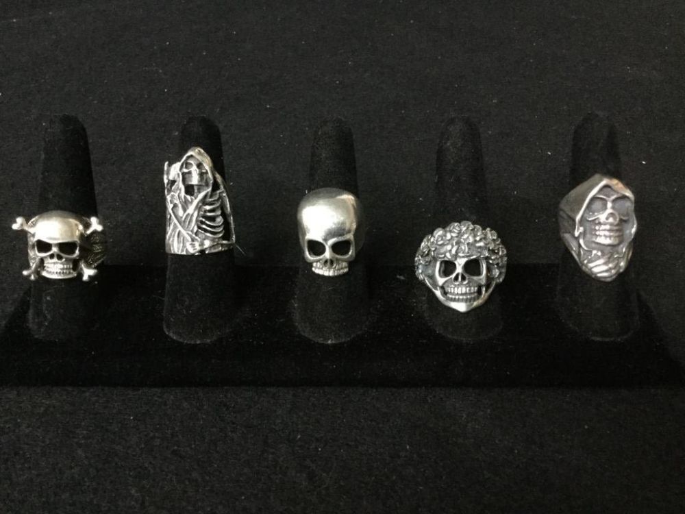 Lot 195: Sterling Skull Rings