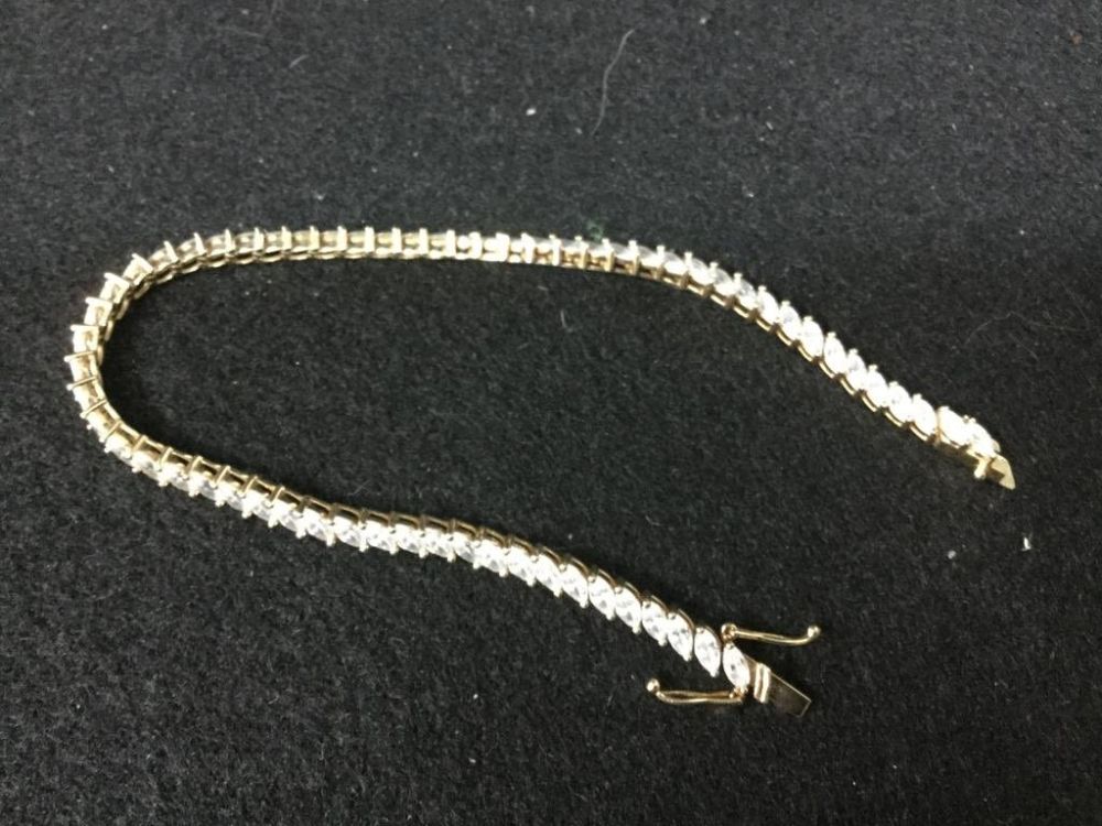 Lot 204: 14 kt Gold CZ Bracelet