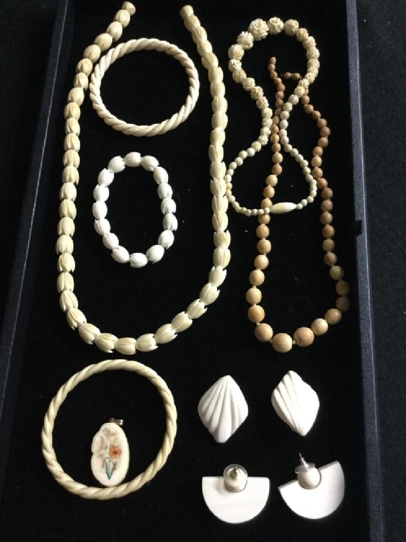 Lot 27: Carved Ivory Jewelry