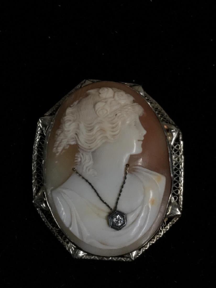 Lot 51: Antique Large 14KT Cameo with old mine diamond