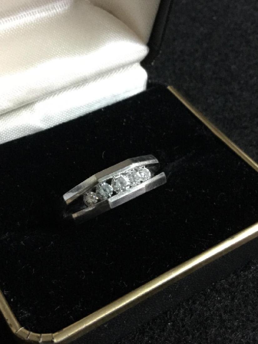 Lot 86: 14kt Mens Ring