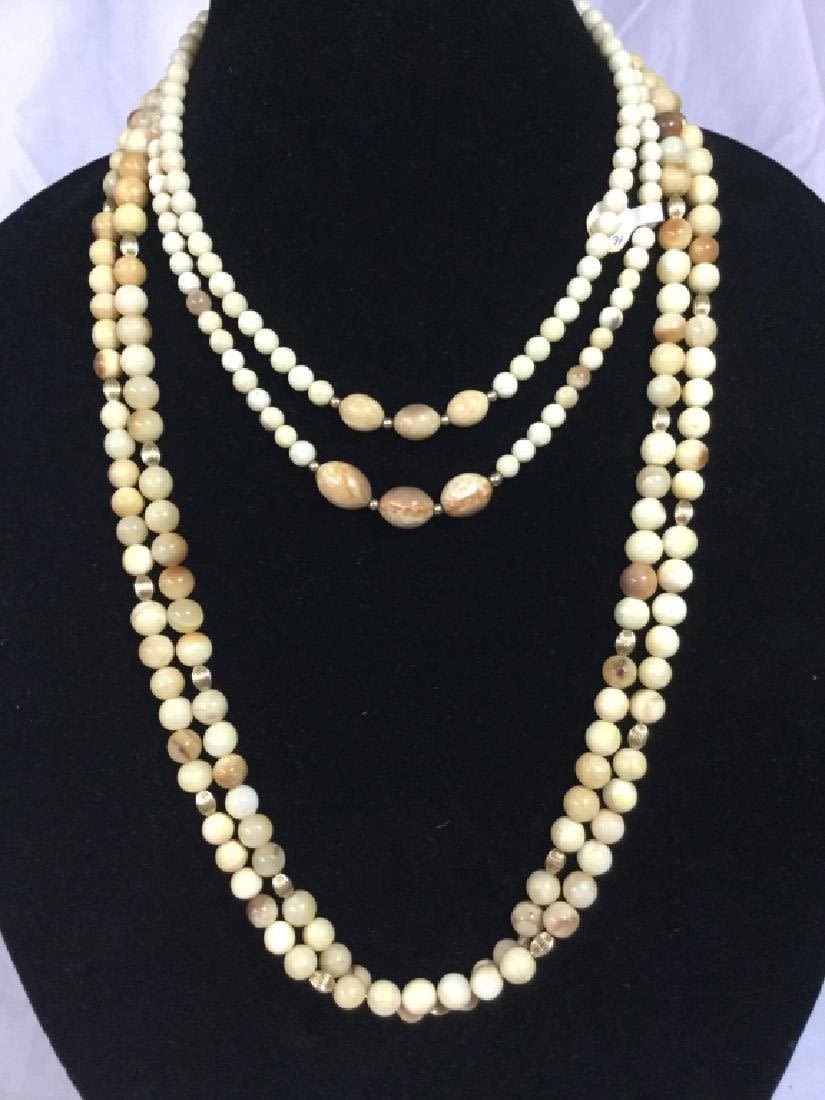 Lot 204: Ivory Necklaces